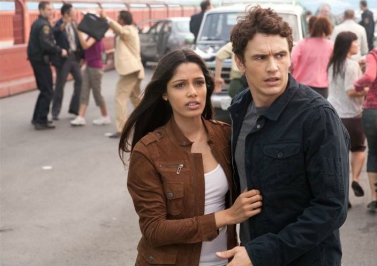 James Franco and Freida Pinto on the Golden Gate Bridge, react to an unfolding battle that will change the world in the science-fiction action drama film 'Rise of the Planet of the Apes.' (Joe Lederer and Twentieth Century Fox Film Corporation)