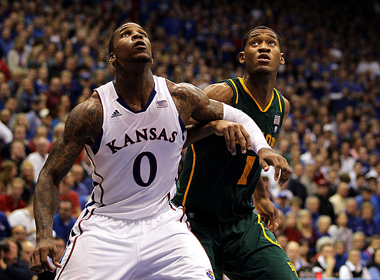 Player of the Year candidate Thomas Robinson (0) of Kansas is averaging 17.7 points and 12.1 rebounds per contest but had 27 and 14 in 92–74 rout of Baylor. (Jamie Squire/Getty Images)