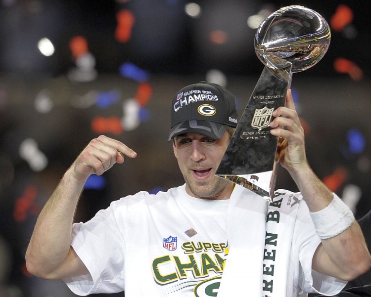 Green Bay quarterback Aaron Rodgers points toward the NFL's most coveted trophy as he celebrates the Super Bowl win over Pittsburgh last February. One of the premier signal-callers in the league, Rodgers seems poised to lead his team back to the top in 2011. (Timothy A. Clary/Getty Images) Green Bay quarterback Aaron Rodgers points toward the NFL's most coveted trophy as he celebrates the Super Bowl win over Pittsburgh last February. One of the premier signal-callers in the league, Rodgers seems poised to lead his team back to the top in 2011. (Timothy A. Clary/Getty Images)