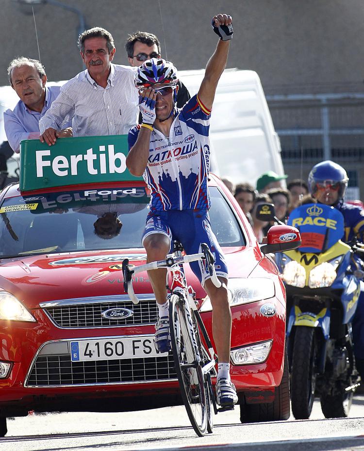 Joaquin Rodriguez of the Katusha team celebrates as he crosses the finish line Stage 14 of the 2010 Vuelta a España. (Jaime Reina/AFP/Getty Images)