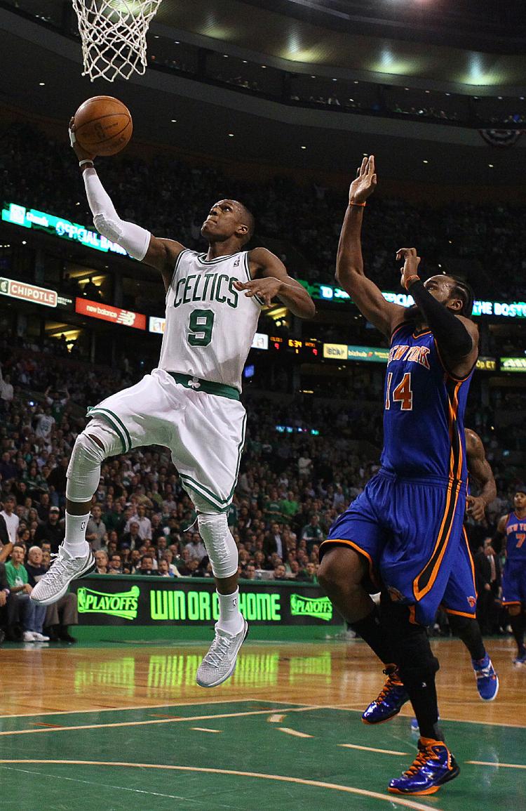 FAST BREAK: Rajon Rondo #9 of the Boston Celtics, on one of his many end-to-end runs, heads for basket past Ronny Turiaf #14 of the New York Knicks. (Elsa/Getty Images)