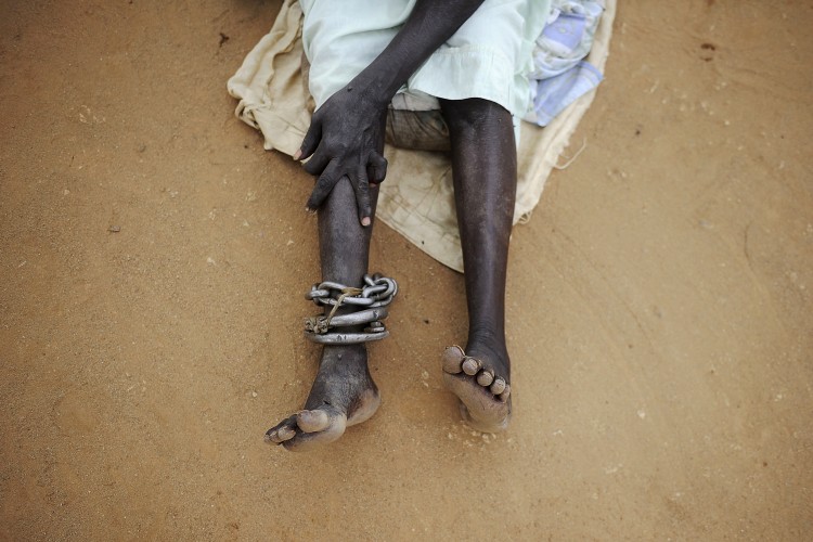 A female inmate sits in the prison yard at Juba's central prison in South Sudan on Oct. 23, 2012. In the capital of the world's newest nation, nearly 200 people await execution in filthy and crowded conditions, with many never having even seen a lawyer. (-/AFP/Getty Images) 