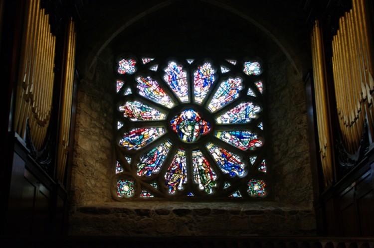 Stained glass window in the 12th century chapel. (Trevor Piper/Epoch Times)