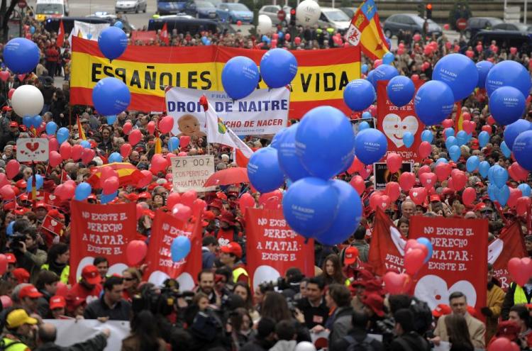 People take part in demonstration to condemn a new abortion law on March 7.in Madrid. Spain's upper house of parliament passed allowing unrestricted abortion into the 14th week of pregnancy. The law is opposed by the predominately Catholic nation. (Pedro Armestre/AFP/Getty Images)