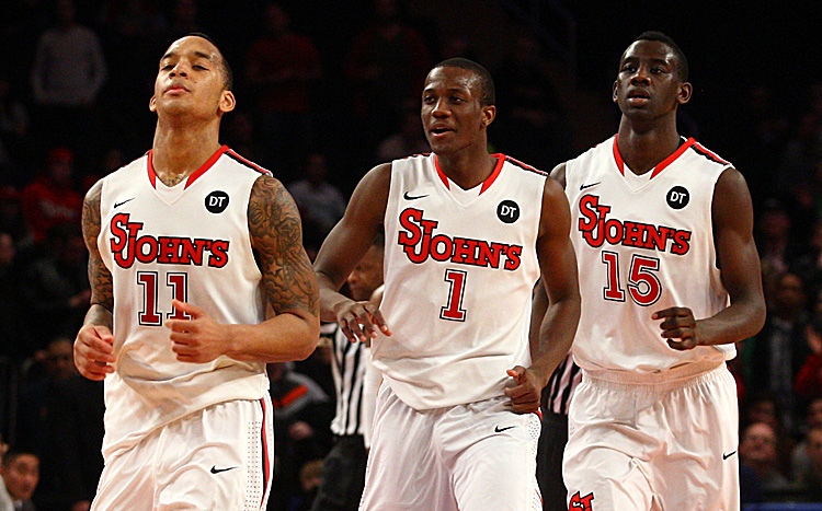 (L-R) D'Angelo Harrison No. 11, Phil Greene No. 1, and Sir'Dominic Pointer No. 15 led the Red Storm to its third straight win Saturday. (Chris Chambers/Getty Images) 