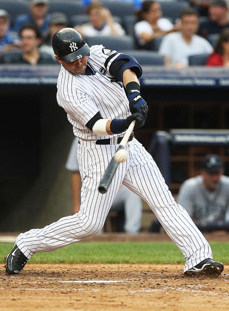 SAVING FACE: Nick Swisher's two-run homer in the bottom of the ninth kept the Yankees from suffering the embarrassment of an Orioles sweep. (Andrew Burton/Getty Images)