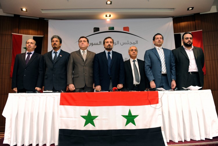 Representatives of the Syrian National Council, at the press conference when they announced the forming of the opposition initiative, August 23. (Bulent Kilic/AFP/Getty Images)
