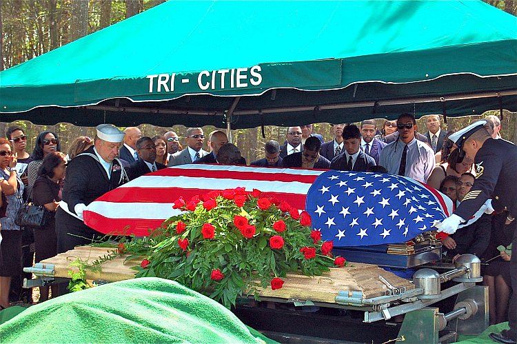 Sailors cover Dr. Lanier Phillips's casket