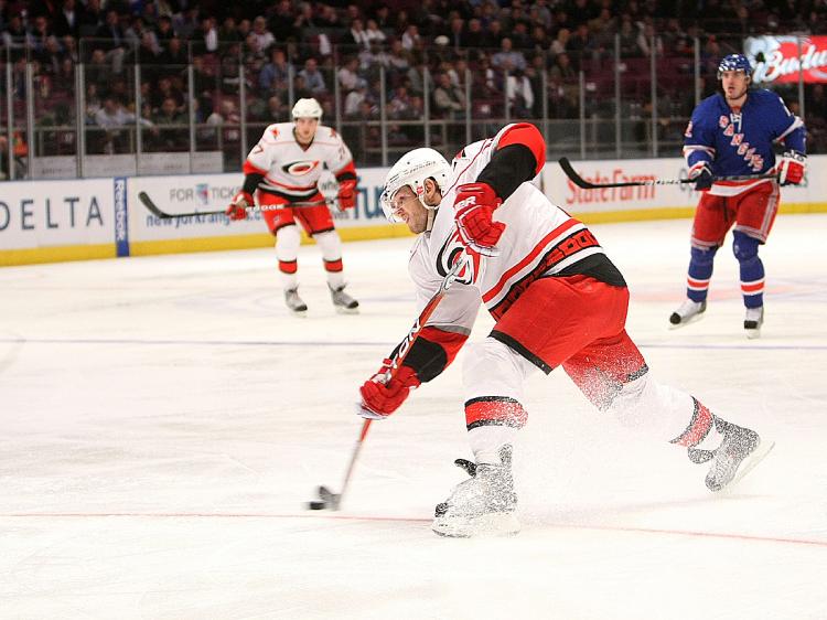 HURRICANE IN MSG: Carolina's Sergei Samsonov scores one of his two goals in a 5-1 win over the Rangers on Wednesday. (Nick Laham/Getty Images)