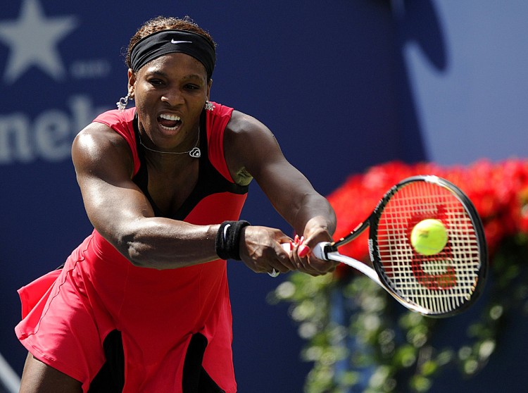 Serena Williams returns a shot against Anastasia Pavlyuchenkova during their Women's Quarterfinal US Open match. (Timothy A. Clary/AFP/Getty Images)