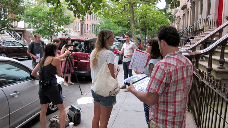  People enjoy the filmmaking process with neighbors on their block.