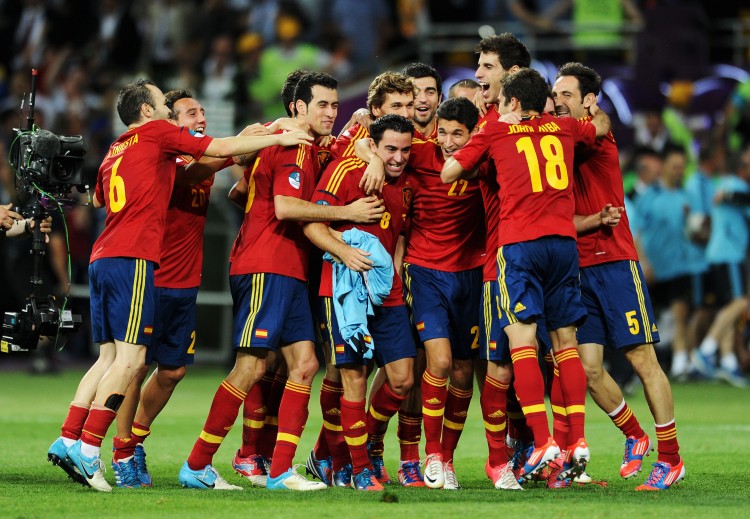 Spain celebrates their Euro 2012 triumph over Italy on Sunday in Ukraine. (Jasper Juinen/Getty Images) 