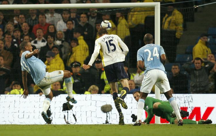 VALUABLE GOAL: Peter Crouch scores the game's only goal as Tottenham grab a precious victory at Manchester City. (IAN KINGTON/AFP/Getty Images)