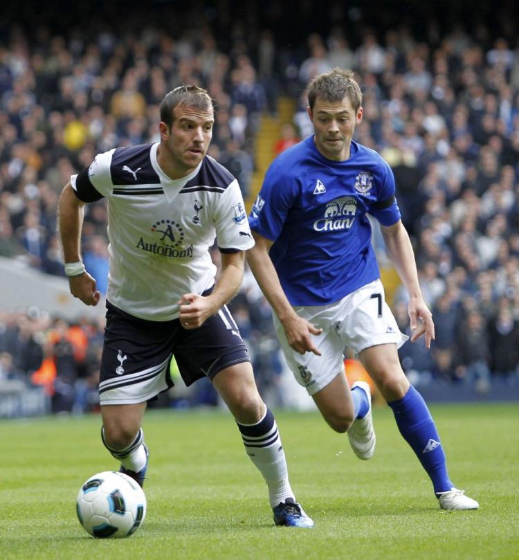 Tottenham's Rafael Van der Vaart and Everton's Diniyar Bilyaletdinov do battle at White Hart Lane in North London on Saturday. (Ian Kington/AFP/Getty Images)