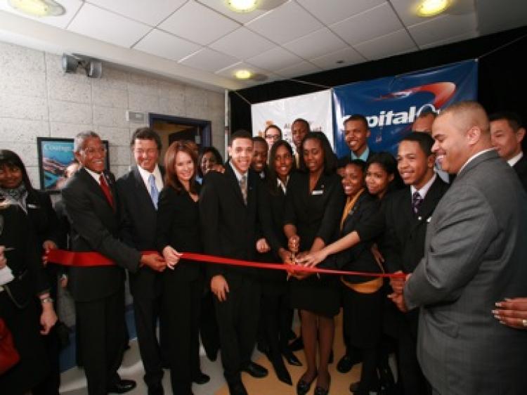 Student bankers cutting the ribbon at the grand opening of the Capital One Bank Branch at Thurgood Marshall Academy (Capital One Bank)