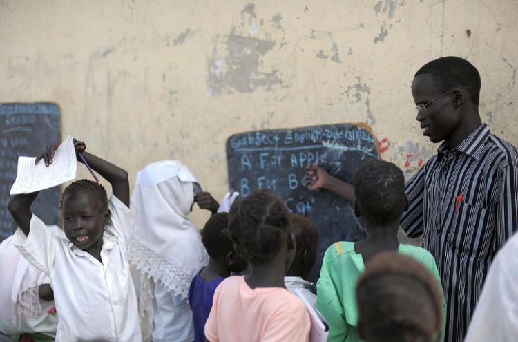 Students take part in an English class at a government school in Bentiu on November 13, 2011. (Roberto Schmidt/AFP/Getty Images)