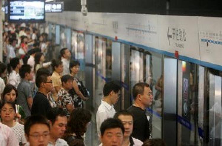 Beijing plans to place microphones in railway carriages and subways to monitor passengers' conversations. (GETTY IMAGES)