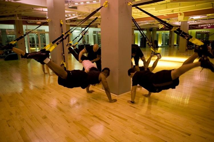 TRX provides a wide array of new and challenging exercises, speeding up your workout and your results.  (Courtesy of Fitness Anywhere)