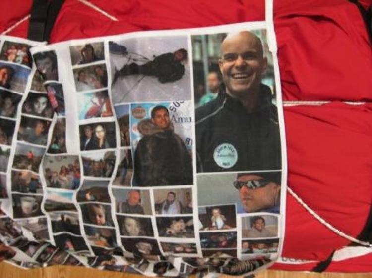 The Flag that Team South Pole Flag are carrying with them to the South Pole, It contains pictures of sponsors and friends (Simone George/Team South Pole Flag)
