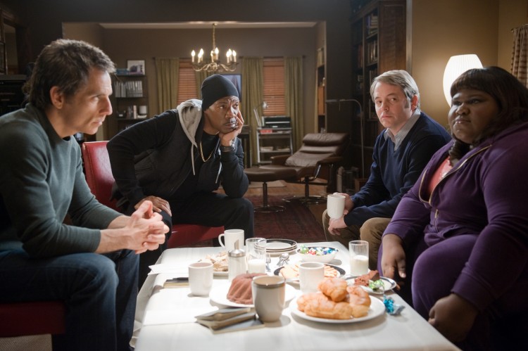 (L-R) Ben Stiller, Eddie Murphy, Matthew Broderick, and Gabourey Sidibe, talk shop in 'Tower Heist,' an action-comedy about a group who seeks revenge on the Wall Street swindler who stiffed them. (David Lee/ Universal Studios)
