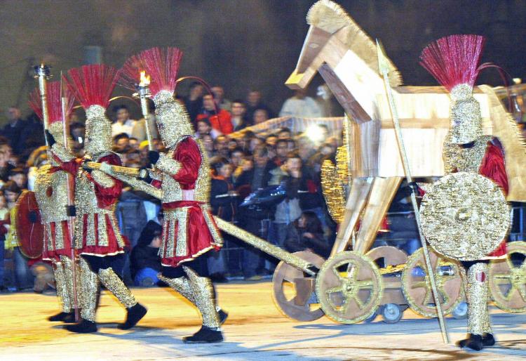 Macedonians dressed as ancient spearmen drag a 'Trojan horse' during the Strumica carnival, in February 2004. (Robert Atanasovski/AFP/Getty Images)