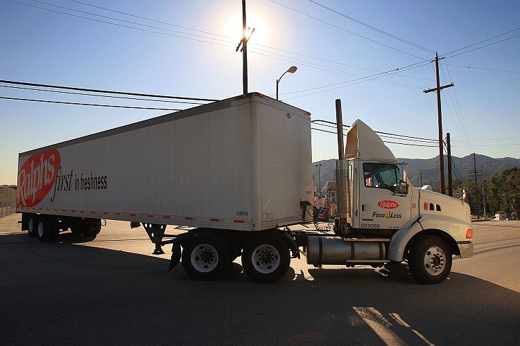 A truck leaves a trucking facility in Glendale, Calif.