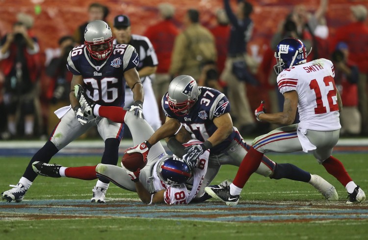David Tyree of the New York Giants makes the most memorable play of Super Bowl XLII against the New England Patriots back in 2008. (Donald Miralle/Getty Images) 