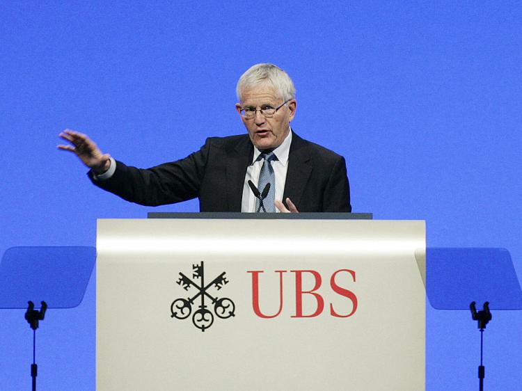 UBS Chairman Kaspar Villiger addresses the bank's annual general meeting in Zurich earlier this year. The Swiss bank recently settled with the IRS to release suspected U.S. tax dodgers. (Sebastian Derungs/AFP/Getty Images)