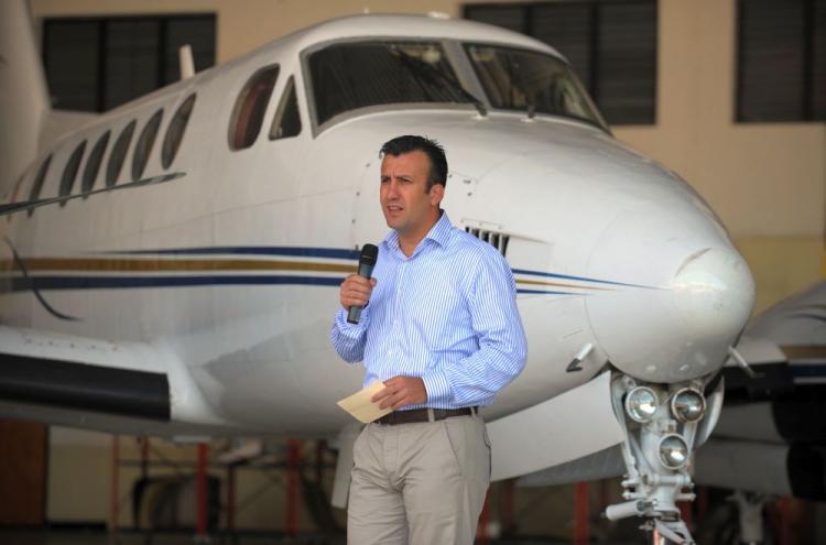 Venezuelan Interior Minister Tareck El Aissami has said there will be an investigation into possible 'police misconduct' surrounding the assault by a criminal gang on Nueva Tacagua Metropolitan Police Station on March 21. He is seen here on Jan. 11 presenting a U.S.-registered light aircraft seized during anti-drug operations in Jan. 2010.  (Juan Barreto/AFP/Getty Images)