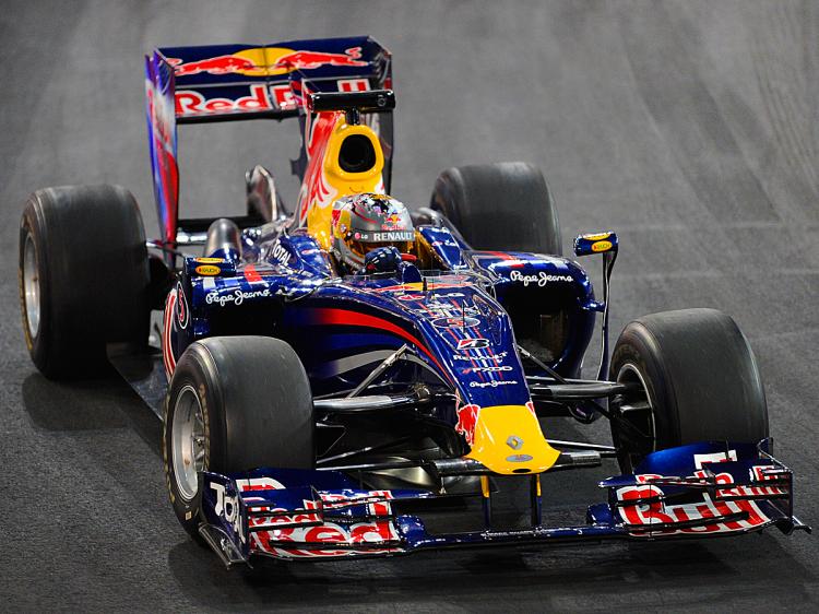 NEW WING COMING: F1 champion Sebastian Vettel drives the Red Bull RB6; its front and rear wings are clearly visible. (Stuart Franklin/Bongarts/Getty Images)