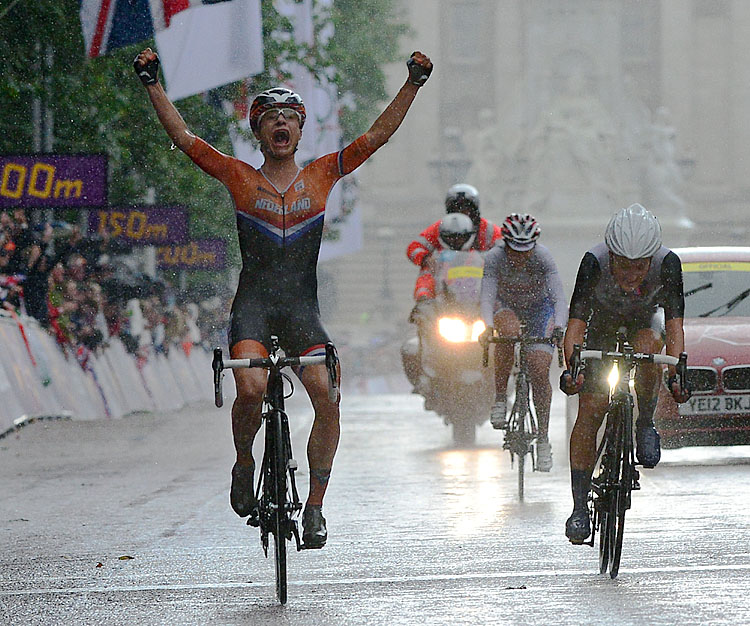 Marianne Vos of The Netherlands (L) wins the women's cycling road race event, ahead of Britain's Elizabeth Armitstead (R) and Russia's Olga Zabelinskaya (C) during the London 2012 Olympic Games. (Carl De Souza/AFP/GettyImages)