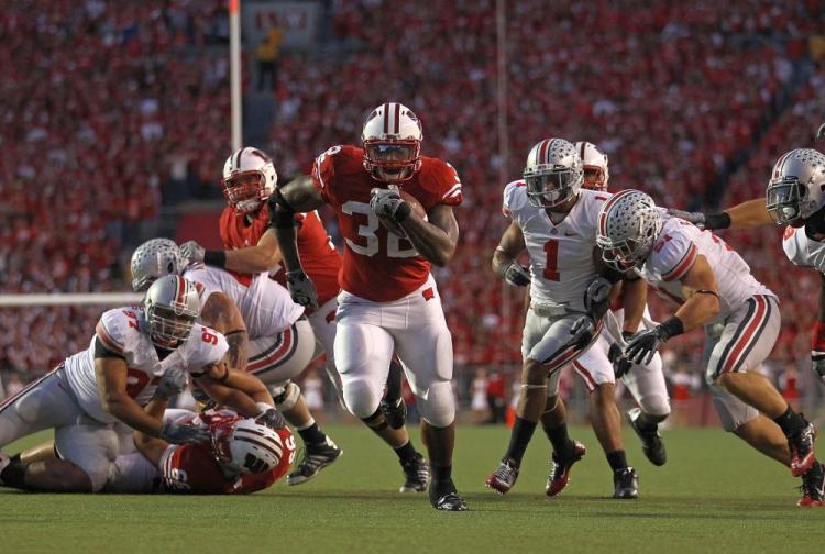 Wisconsin's John Clay runs past Ohio State's defense and in for a touchdown on Saturday. (Jonathan Daniel/Getty Images)