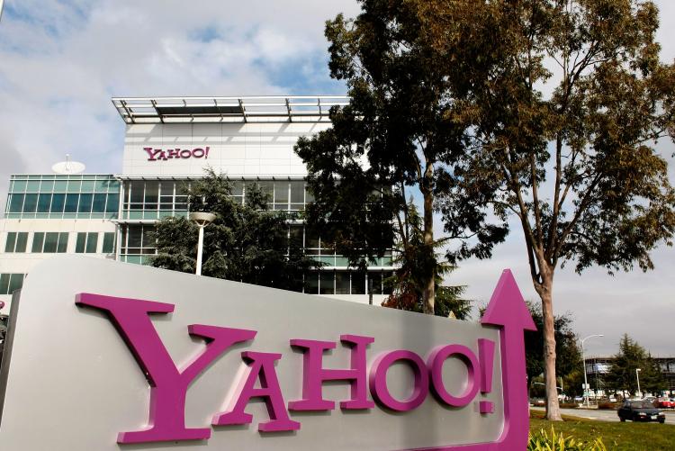 The Yahoo logo is seen on a sign outside of the Yahoo Sunnyvale campus in Sunnyvale, California. Yahoo Inc. said that it had agreed to buy web content publisher Associated Content on Tuesday.  (Justin Sullivan/Getty Images)