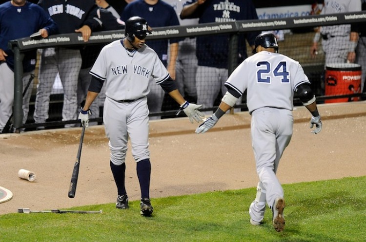 Robinson Cano (right) and Curtis Granderson each won Silver Slugger Awards. (Greg Fiume/Getty Images)