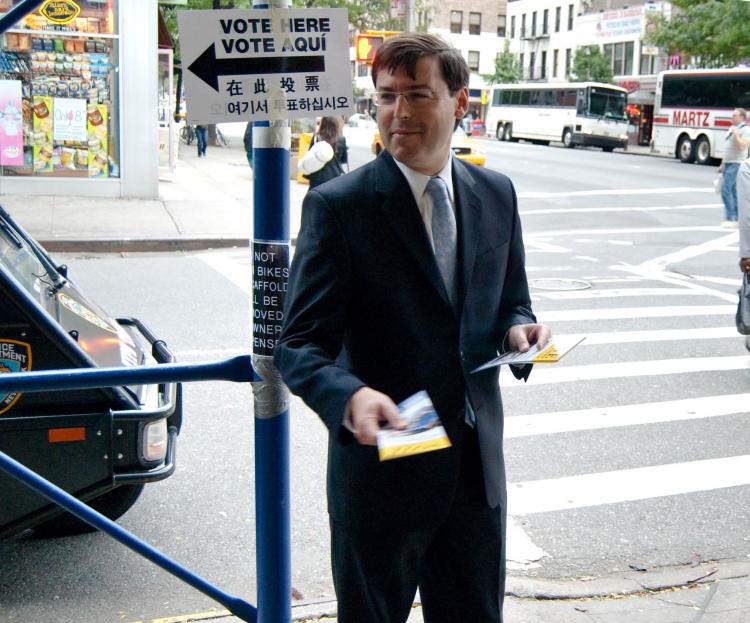 Comptroller candidate David Yassky does some last minute campaigning on the corner of 9th Ave. and 43rd Street in Manhattan, on Tuesday, the day of the runoff elections. (Joshua Philip/The Epoch Times)