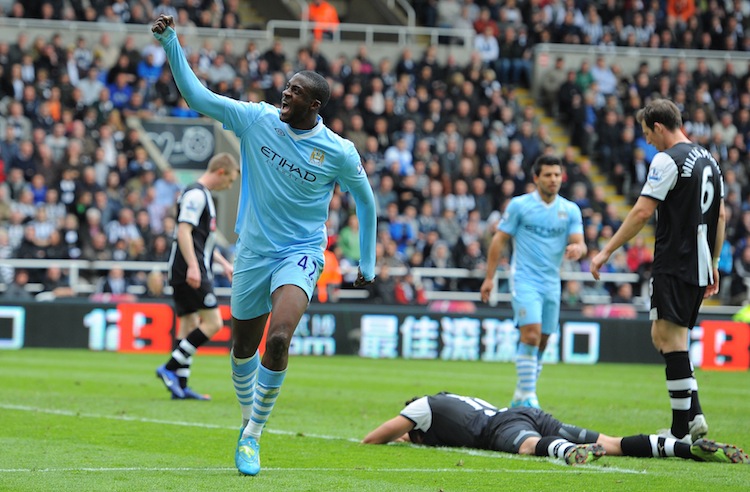  Manchester City's Yaya Toure celebrates his second goal in beating Newcastle. (Andrew Yates/AFP/GettyImages)