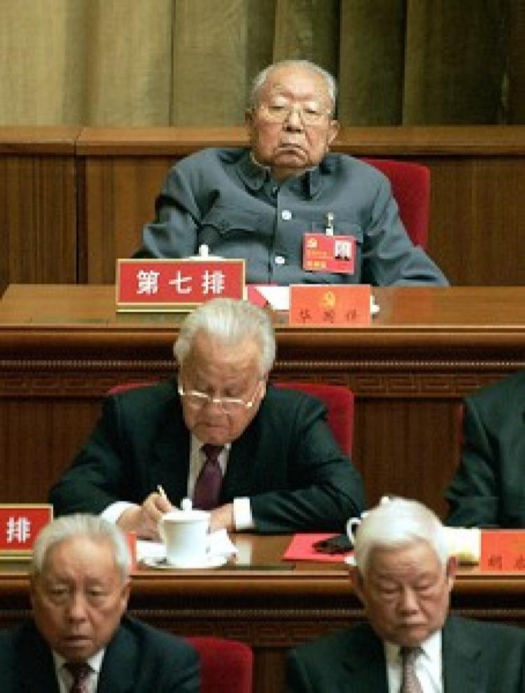 Former Chinese Communist Party leader Hua Guofeng (rear) died on August 20, 2008. He was 87.  (Goh Chai Hin/AFP/Getty Images)