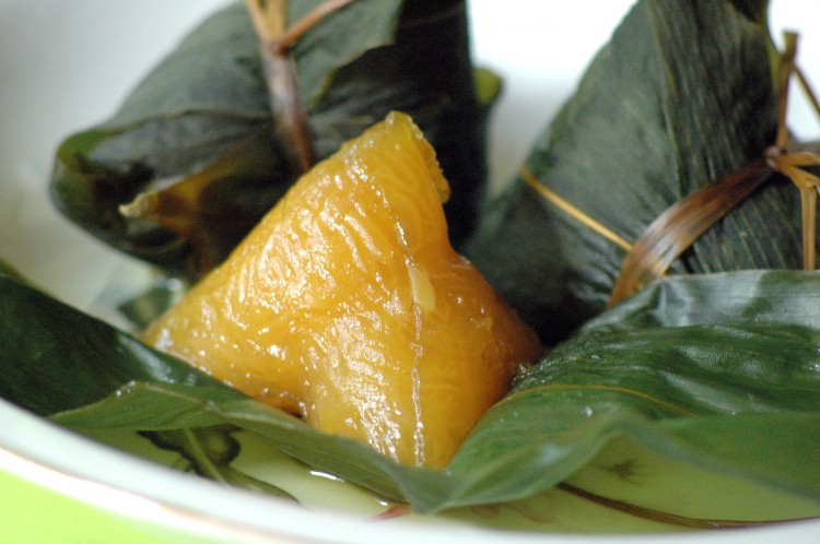 RICE DUMPLING: Zongzi is usually made of glutinous rice stuffed with different fillings and wrapped in bamboo or reed leaves. (The Epoch Times)
