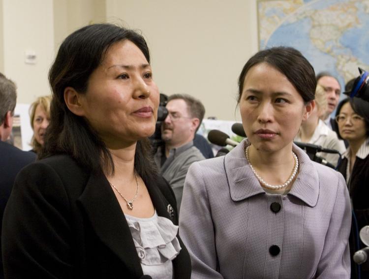 TESTIFYING: Geng He (L) at the Rayburn Building where she gave testimony about the persecution of her husband and family, on Jan. 18. (Lisa Fan/The Epoch Times)