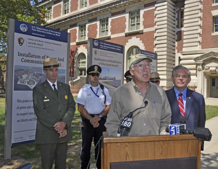 Secretary of the Interior Ken Salazar (C), Sen. Robert Menendez (R), Dave Luchsinger, superintendent of the Statue of Liberty and Ellis Island (L), at a press conference for announcing three restoration projects planned on Ellis and Liberty islands, July 26.  (Kevin Daley/National Park Service)