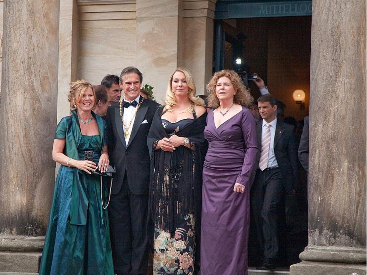 The Green Hill's new ladies: Katharina Wagner, 31, and Eva Wagner-Pasquier, 64 R) welcoming VIPs at the show's afternoon opening on July 25. (Bayreuther Festspiele)