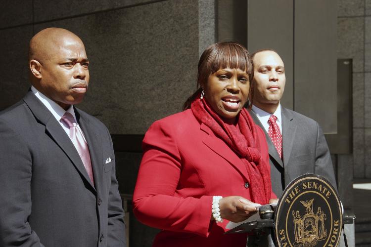 MAKING A LIST: State Sen. Eric Adams (L), Assemblywoman Vanessa Gibson (C), and Assemblyman Hakeem Jeffries propose new legislation Sunday that will require convicted domestic violence offenders to register their crimes in a database.  (Ivan Pentchoukov/The Epoch Times)