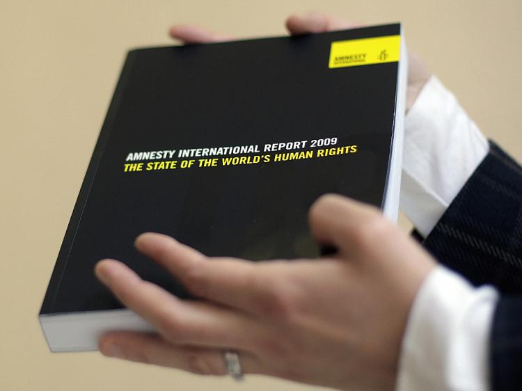 The Amnesty International Report 2009 cites the Chinese regime for stepping up human rights abuses around the time of the Olympics. (Shaun Curry/AFP/Getty Images)