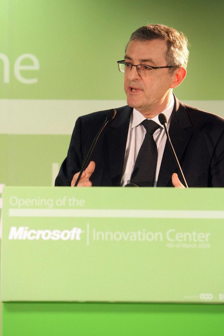 Microsoft Vice-President for Europe John Vasallo speaks on March 4, 2009 during the inauguration of Belgium's first Microsoft Innovation Center (MIC) in Mons. The European Commission said on March 4 it was easing monitoring of Microsoft's compliance with a landmark 2004 antitrust ruling against the US software giant. Under the ruling, Microsoft is supposed to give its competitors access to information needed for developing products that can operate with the group's software. (Virginie Lefour/AFP/Getty Images)