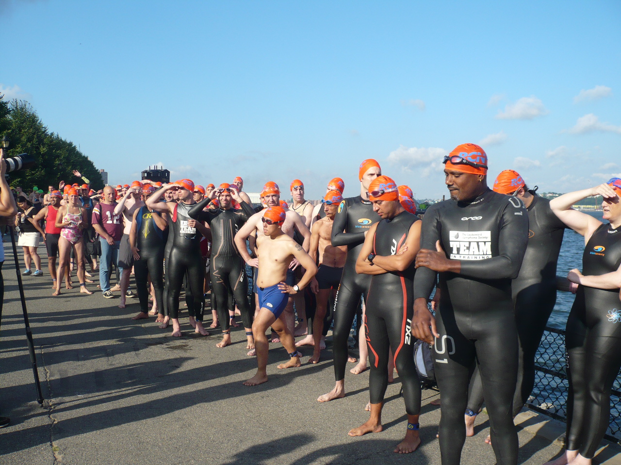 PUMPED: Swimmers await the go-ahead to jump into the water at the Aquathlon on July 13, hosted by the Manhattan Island Foundation on the Hudson River. (Christine Lin/The Epoch Times)