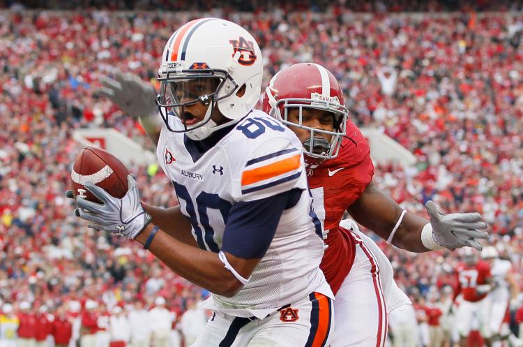 Auburn vs. Alabama: Emory Blake #80 of the Auburn Tigers pulls in this touchdown against Mark Barron #4 of the Alabama Crimson Tide at Bryant-Denny Stadium on November 26, 2010 in Tuscaloosa, Alabama. (Kevin C. Cox/Getty Images)