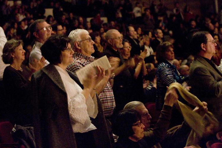 Members of audience give the Spectacular a standing ovation.  (The Epoch Times)
