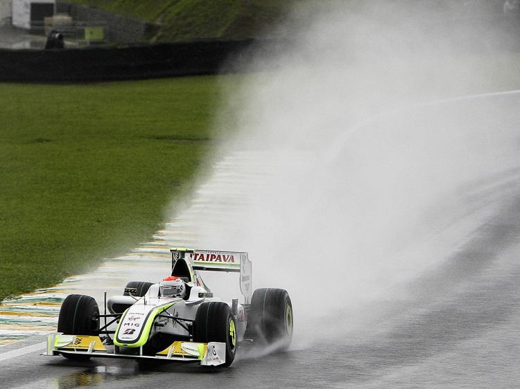 Brazilian Formula One driver Rubens Barrichello battles the wet to put his his Brawn GP onto the pole of the Brazilian F1 Grand Prix, on October 17, 2009, at Interlagos racetrack in Sao Paulo, Brazil. (Orlando Kissner/AFP/Getty Images)