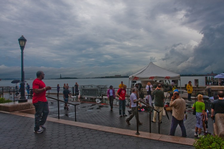 Television and media crews occupy Battery Park in New York on the afternoon of Saturday, Aug. 27., ahead of Hurricane Irene. (Robert Counts/The Epoch Times)