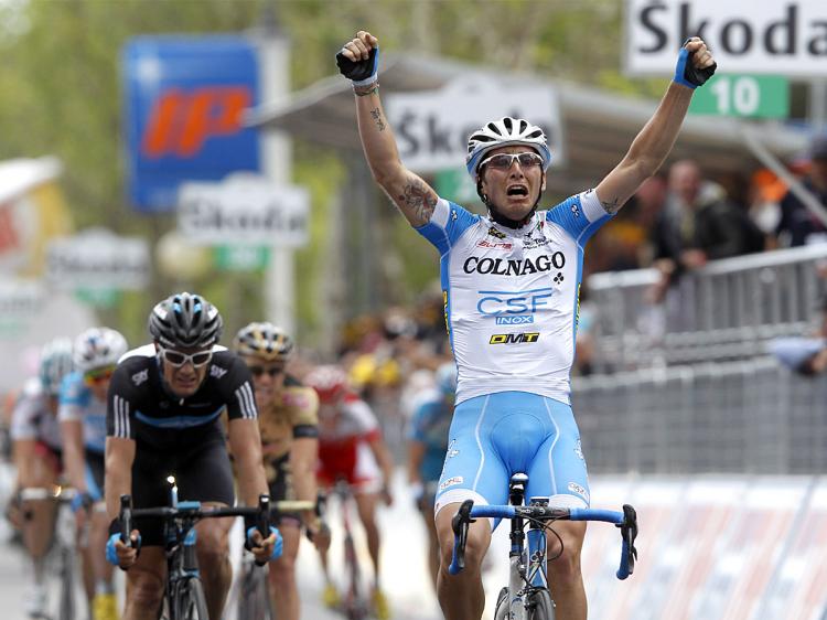 Manuel Belletti celebrates as he crosses the finish line to win Stage 13 of the 93rd Giro d'Italia. (Luk Beines/AFP/Getty Images)